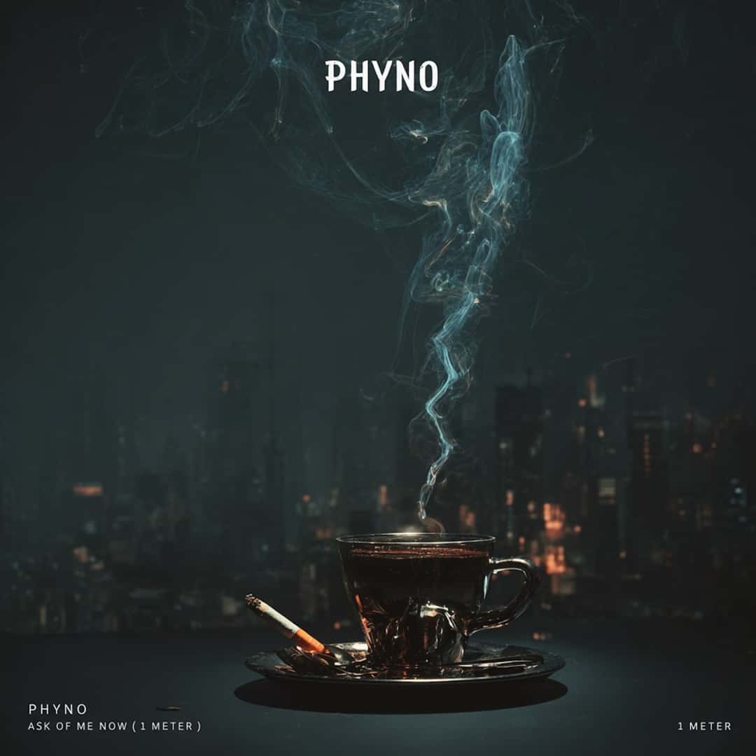 Portada del single «Ask of Me», de Phyno: una taza de té humeante y un cigarrillo sobre un platito, con luces de una ciudad de noche de fondo