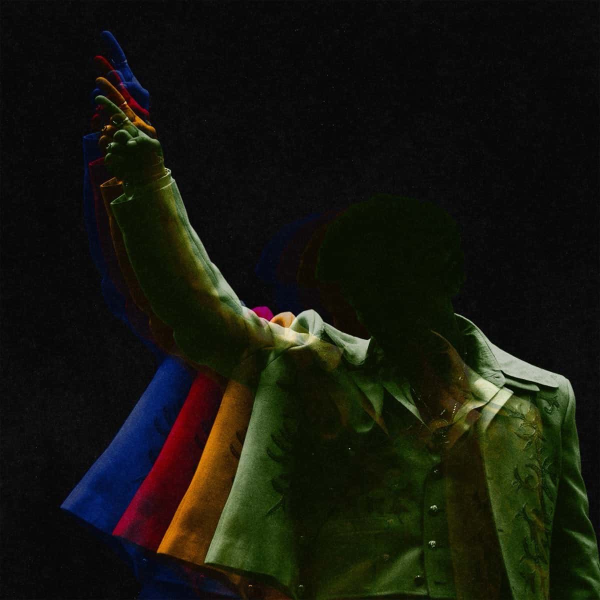 Portada oficial del remix de «I Just Might», de Bruno Mars: el cantante, de traje claro y con un brazo en alto, con su silueta repetida en azul, rojo y naranja sobre fondo negro