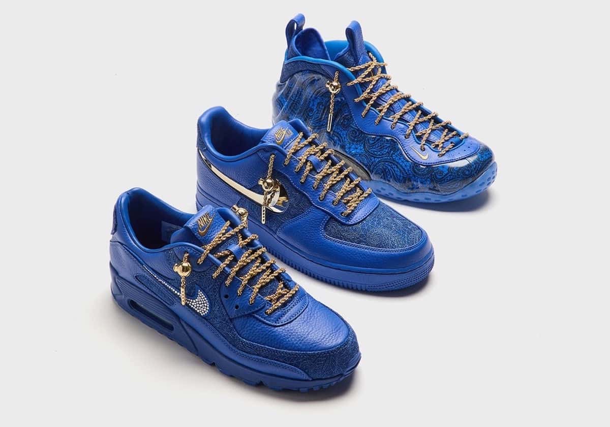 Air Max 90, Air Force 1 Low y Air Foamposite One de Victor Solomon x Nike Blue Trophies en azul con cordones de soga dorados, sobre fondo gris claro